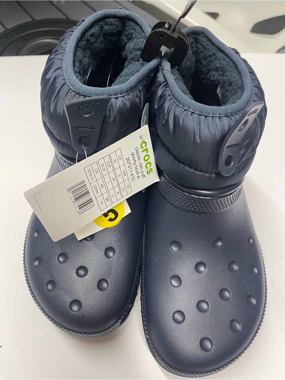 Big kid size 5. CROCS Kids Navy Fuzz-Lined Waterproof Boot Clogs